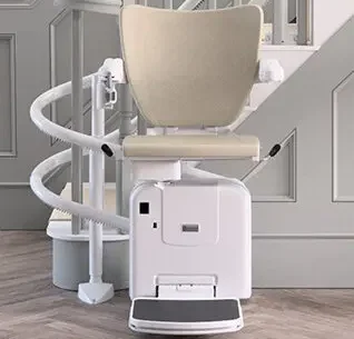 Curved Stairlift with footrest folded out.