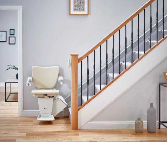 A-straight-stairlift-with-a-tan-seat