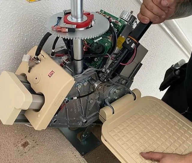 A stairlift being repaired.