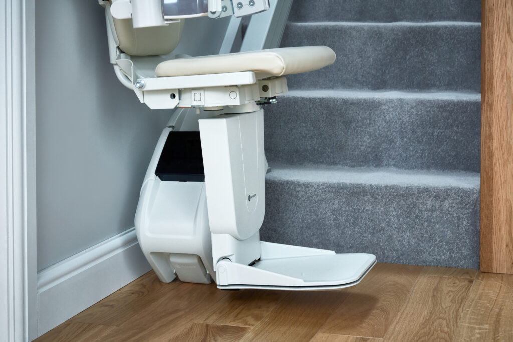 Close up of a Stairlift with the footrest unfolded.