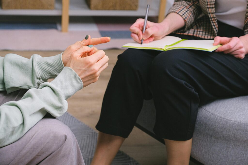 an occupational therapist discussing a clients needs