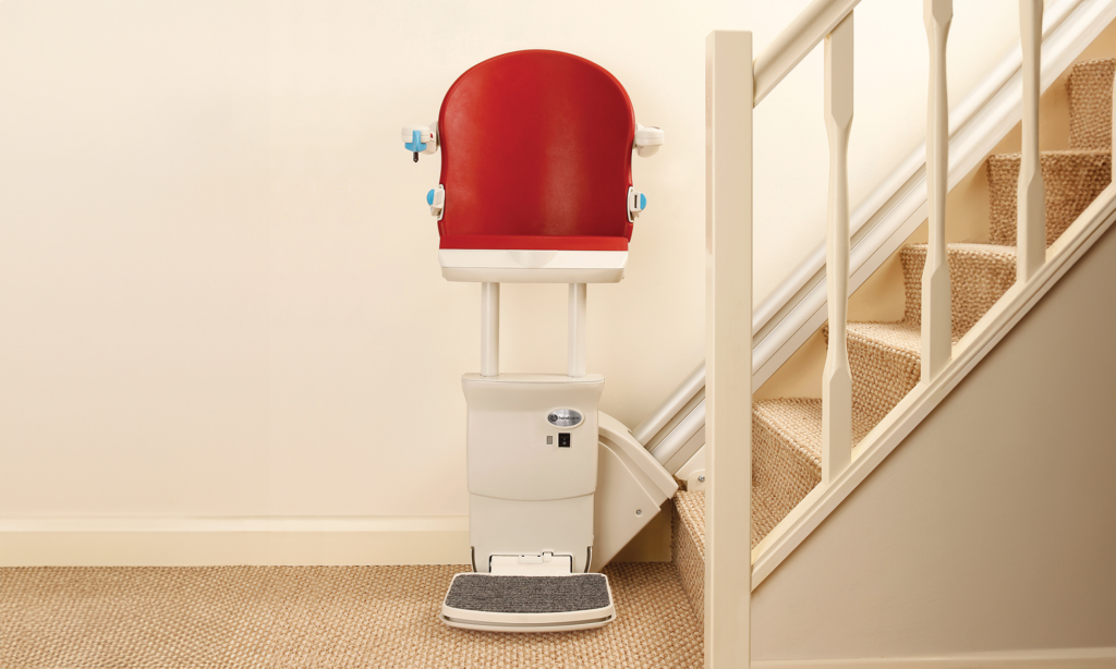 Handicare 1000 perched seat standing stair lift.